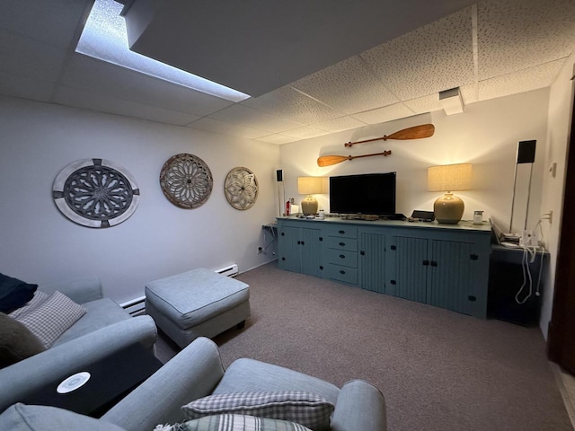 2505 Robinsdale Ave, La Crosse, WI 54601 - carpeted living area featuring a drop ceiling and a baseboard radiator