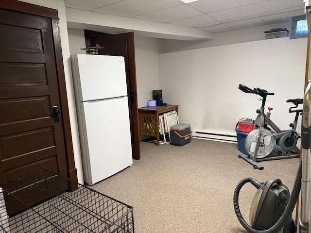 2505 Robinsdale Ave, La Crosse, WI 54601 - exercise room featuring a baseboard heating unit and carpet