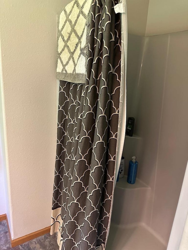 W6767 Pine Ave, Medford, WI 54451 - full bath featuring a shower with curtain and baseboards