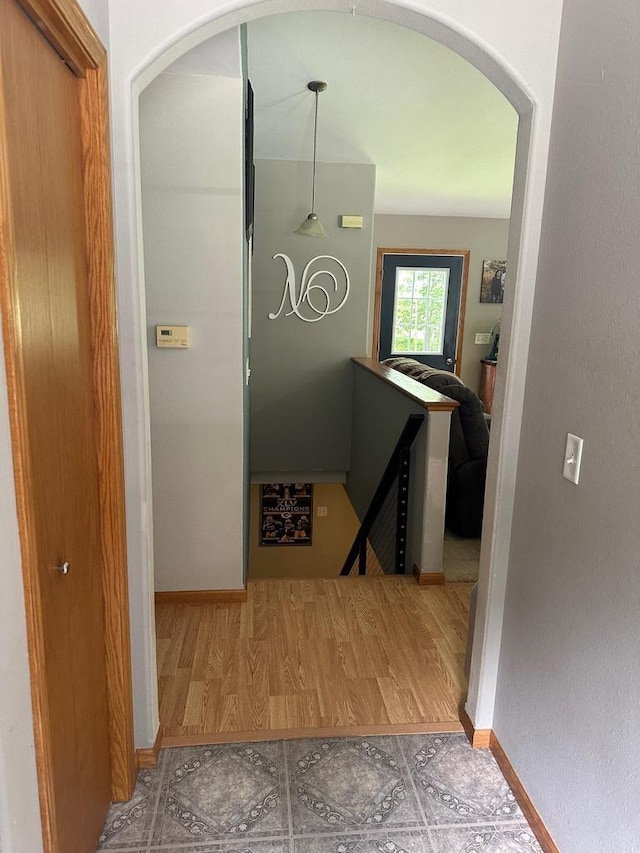 W6767 Pine Ave, Medford, WI 54451 - hallway featuring an upstairs landing and arched walkways