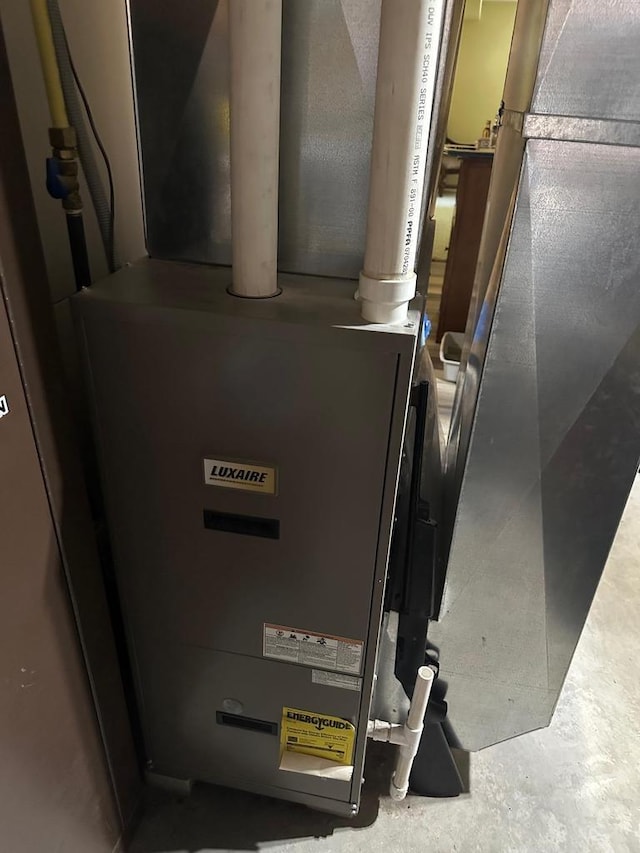 W6767 Pine Ave, Medford, WI 54451 - utility room with heating unit