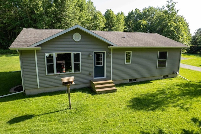 W6767 Pine Ave, Medford, WI 54451 - back of property with entry steps, a lawn, and roof with shingles