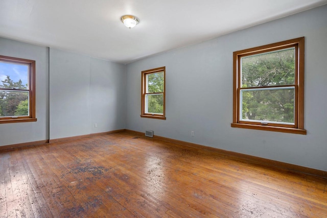 613 Pleasant View St, Wauwatosa, WI 53226 - unfurnished room featuring hardwood / wood-style floors and baseboards