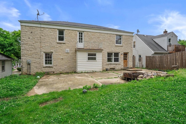 613 Pleasant View St, Wauwatosa, WI 53226 - rear view of house with stone siding and a patio