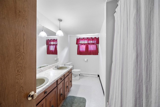 W4976 Pinewood Ln, Merrill, WI 54452 - full bathroom with double vanity and a baseboard radiator