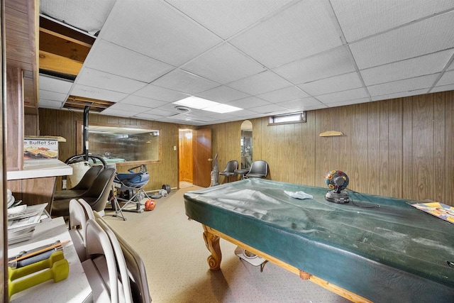 W4976 Pinewood Ln, Merrill, WI 54452 - recreation room featuring a drop ceiling, wooden walls, and carpet floors