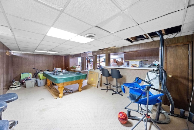 W4976 Pinewood Ln, Merrill, WI 54452 - rec room featuring wooden walls, carpet flooring, and a drop ceiling