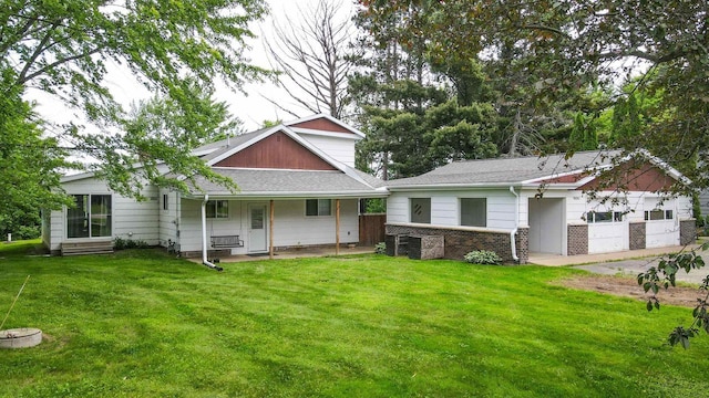 W4976 Pinewood Ln, Merrill, WI 54452 - back of house with a yard and a porch