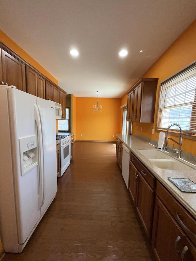 7918 Fredricksburg Ct Unit 101, Bristol, WI 53104 - kitchen with white appliances, a chandelier, recessed lighting, dark wood-style floors, and light countertops