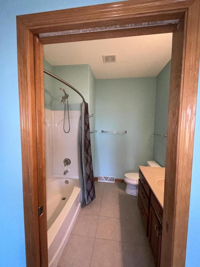 7918 Fredricksburg Ct Unit 101, Bristol, WI 53104 - bathroom featuring vanity, tile patterned flooring, and shower / tub combo