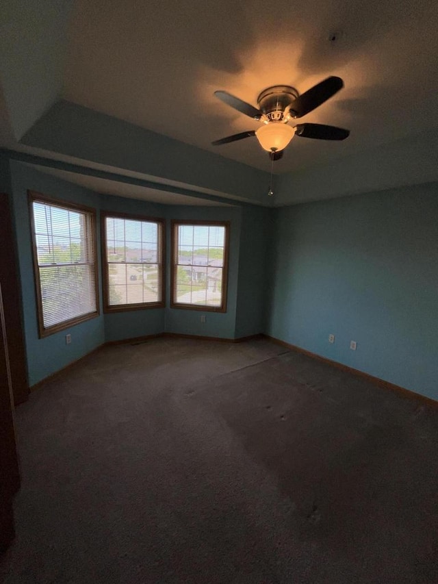 7918 Fredricksburg Ct Unit 101, Bristol, WI 53104 - unfurnished room featuring carpet, healthy amount of natural light, and ceiling fan