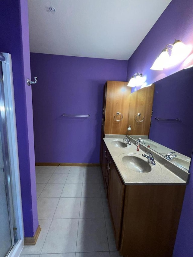 7918 Fredricksburg Ct Unit 101, Bristol, WI 53104 - bathroom featuring double vanity and tile patterned flooring