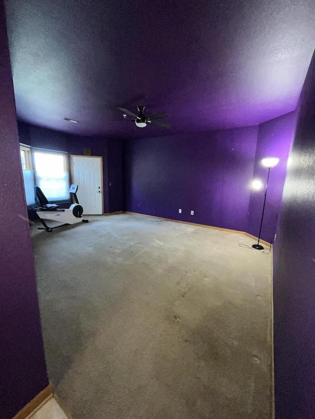 7918 Fredricksburg Ct Unit 101, Bristol, WI 53104 - empty room with carpet, a textured ceiling, and a ceiling fan