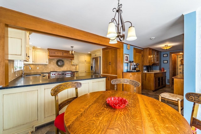 918 Fulton St, Wausau, WI 54403 - dining space featuring a chandelier