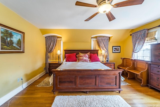 918 Fulton St, Wausau, WI 54403 - bedroom featuring wood finished floors, vaulted ceiling, and ceiling fan