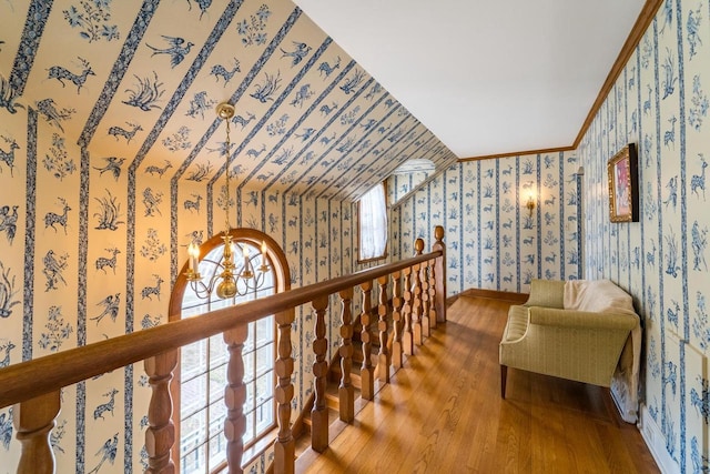 918 Fulton St, Wausau, WI 54403 - living area featuring wallpapered walls, wood finished floors, and ornamental molding