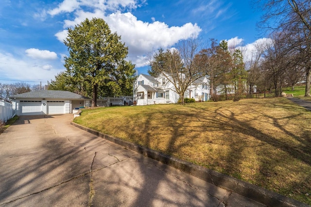 918 Fulton St, Wausau, WI 54403 - view of front of home with a detached garage and a front yard