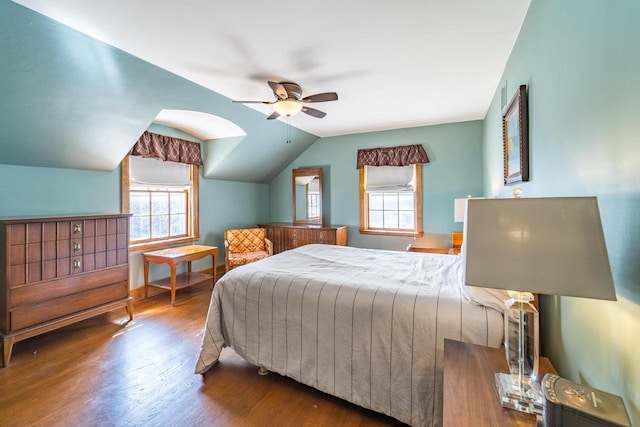 918 Fulton St, Wausau, WI 54403 - bedroom with wood finished floors, lofted ceiling, and a ceiling fan