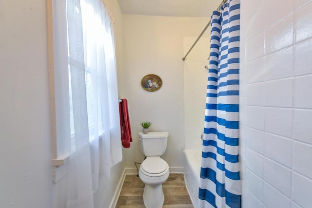 2710 W Fairmount Ave, Milwaukee, WI 53209 - bathroom with plenty of natural light, wood finished floors, and shower / bath combination with curtain