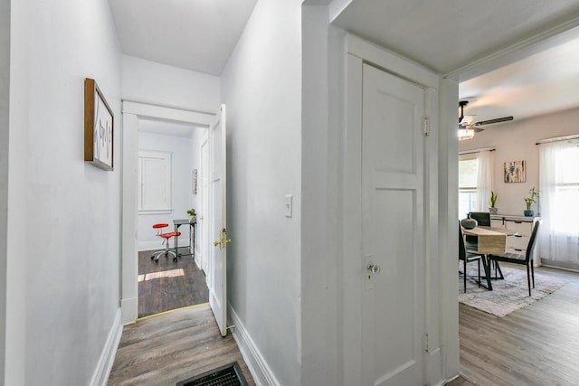 2710 W Fairmount Ave, Milwaukee, WI 53209 - corridor featuring wood finished floors and baseboards