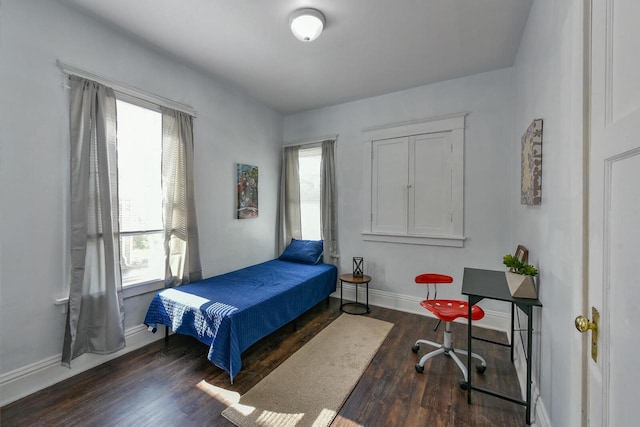 2710 W Fairmount Ave, Milwaukee, WI 53209 - bedroom with multiple windows and wood finished floors