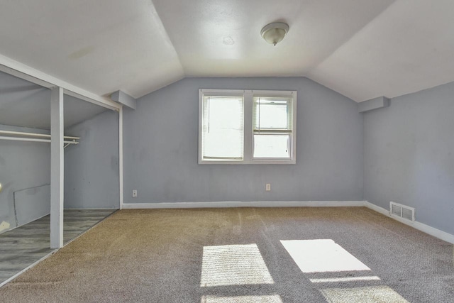2710 W Fairmount Ave, Milwaukee, WI 53209 - bonus room featuring carpet floors and lofted ceiling