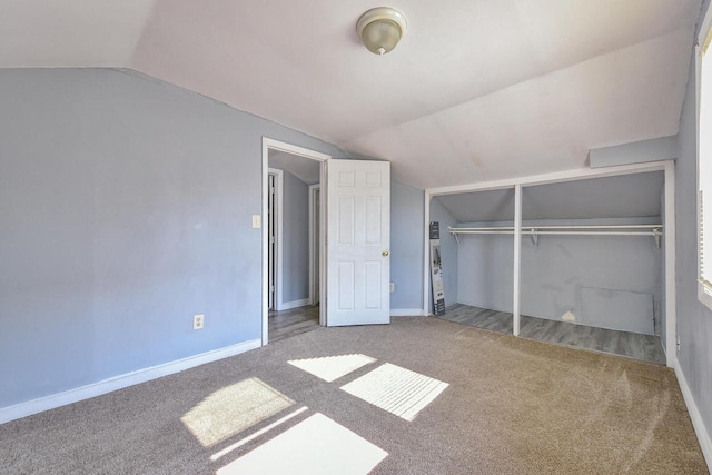 2710 W Fairmount Ave, Milwaukee, WI 53209 - unfurnished bedroom featuring carpet floors, lofted ceiling, and a closet