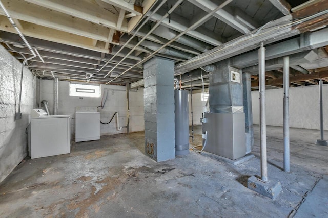 2710 W Fairmount Ave, Milwaukee, WI 53209 - below grade area featuring washing machine and dryer, gas water heater, and heating unit