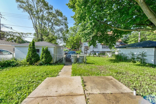2710 W Fairmount Ave, Milwaukee, WI 53209 - view of yard featuring a gate and a patio area