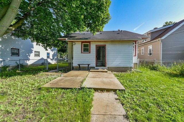 2710 W Fairmount Ave, Milwaukee, WI 53209 - back of house featuring a fenced backyard and a patio area