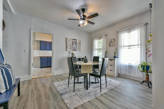 2710 W Fairmount Ave, Milwaukee, WI 53209 - dining room with light wood-style floors and a ceiling fan