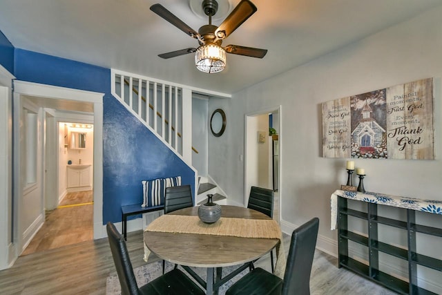 2710 W Fairmount Ave, Milwaukee, WI 53209 - dining space featuring stairway, a ceiling fan, and wood finished floors