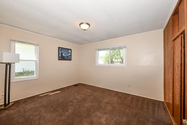 6148 N 38th St, Milwaukee, WI 53209 - unfurnished bedroom featuring dark carpet, crown molding, and a closet