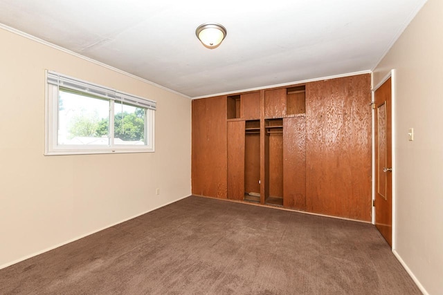 6148 N 38th St, Milwaukee, WI 53209 - unfurnished bedroom with carpet, crown molding, and a closet
