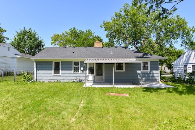 6148 N 38th St, Milwaukee, WI 53209 - back of house featuring a patio, a chimney, and roof with shingles