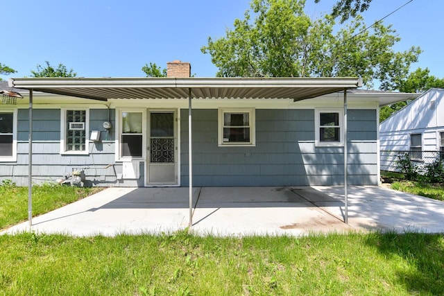 6148 N 38th St, Milwaukee, WI 53209 - ranch-style house featuring a chimney and a patio area