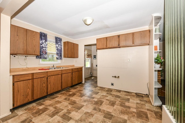 6148 N 38th St, Milwaukee, WI 53209 - kitchen with brown cabinetry, light countertops, and stone finish flooring