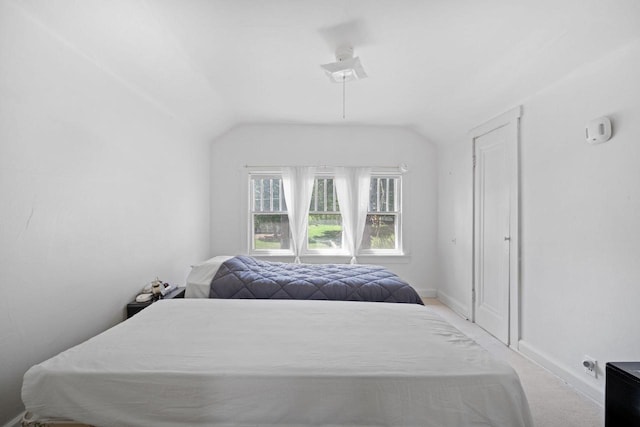 12600 W Prospect Dr, New Berlin, WI 53151 - bedroom with lofted ceiling and light colored carpet