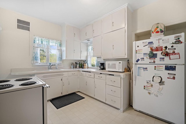 12600 W Prospect Dr, New Berlin, WI 53151 - kitchen featuring white appliances, light countertops, and white cabinetry