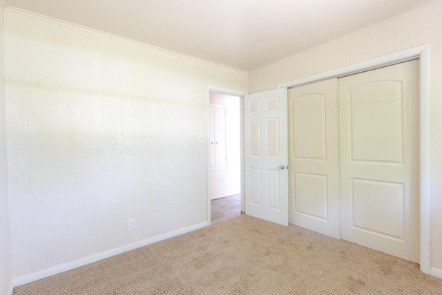 7309 S 46th St, Franklin, WI 53132 - unfurnished bedroom with carpet floors, a closet, and ornamental molding