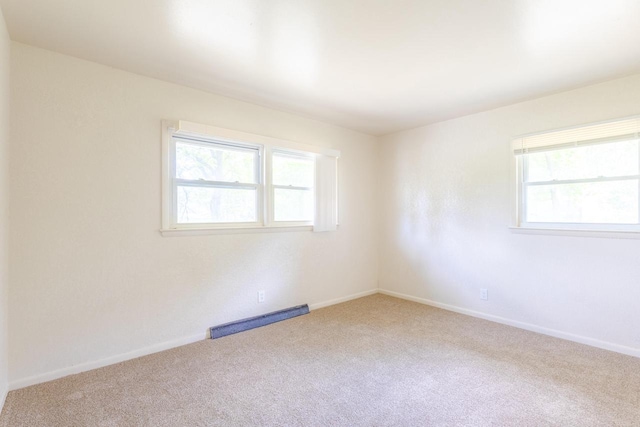 7309 S 46th St, Franklin, WI 53132 - unfurnished room featuring healthy amount of natural light and carpet flooring