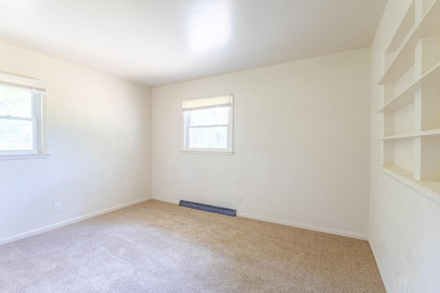 7309 S 46th St, Franklin, WI 53132 - empty room featuring carpet flooring and baseboards