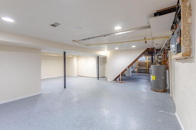 7309 S 46th St, Franklin, WI 53132 - finished below grade area with water heater, recessed lighting, and stairs