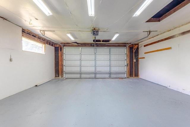 7309 S 46th St, Franklin, WI 53132 - garage featuring a garage door opener
