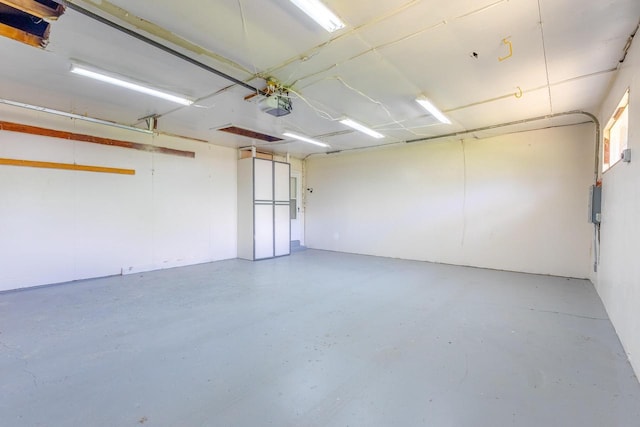 7309 S 46th St, Franklin, WI 53132 - garage featuring a garage door opener