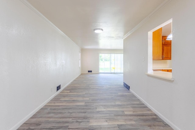 7309 S 46th St, Franklin, WI 53132 - hallway with wood finished floors and ornamental molding