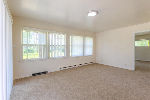 7309 S 46th St, Franklin, WI 53132 - carpeted empty room with a baseboard radiator and baseboards