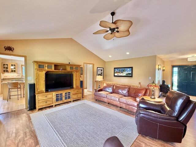7975 Summit Dr, Delavan, WI 53115 - living area featuring vaulted ceiling, light wood-style flooring, a ceiling fan, and recessed lighting