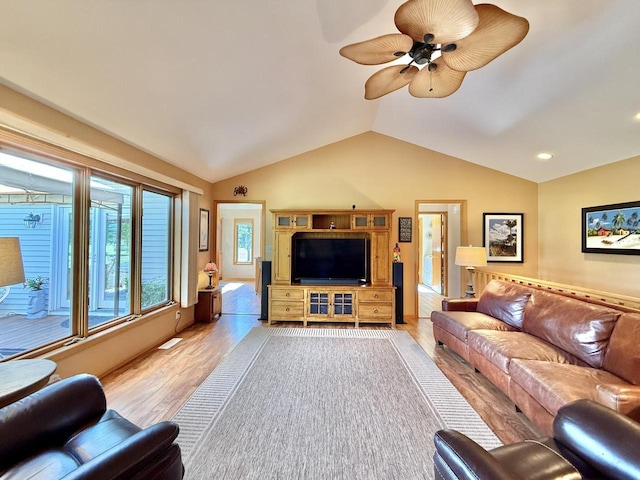 7975 Summit Dr, Delavan, WI 53115 - living room with lofted ceiling, ceiling fan, light wood finished floors, and recessed lighting