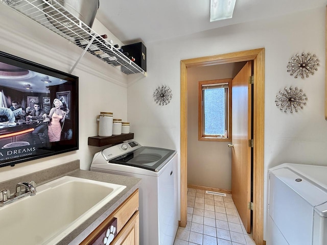 7975 Summit Dr, Delavan, WI 53115 - laundry room with washing machine and dryer and light tile patterned floors